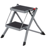 ▶ Escalera de 2 peldaños Plegable, Ancho de Marcha 20 cm, Goma Antideslizante, con asa, Carga 150 kg, Acero, Gris y Negro GSL002GY01