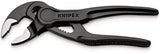 ▶ KNIPEX Cobra® XS Llave para tubos y tenaza para bombas de agua gris atramentado, superficie rugosa y en relieve 100 mm (cartulina autoservicio/blíster) 87 00 100 BK