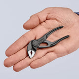 ▶ KNIPEX Cobra® XS Llave para tubos y tenaza para bombas de agua gris atramentado, superficie rugosa y en relieve 100 mm (cartulina autoservicio/blíster) 87 00 100 BK